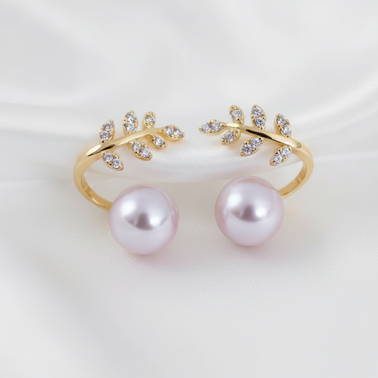 Pearl & Crystal Leaf Earrings - Detail on White Silk