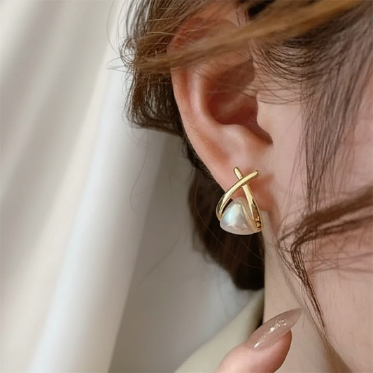 Pearl Earring on Ear Silk Background